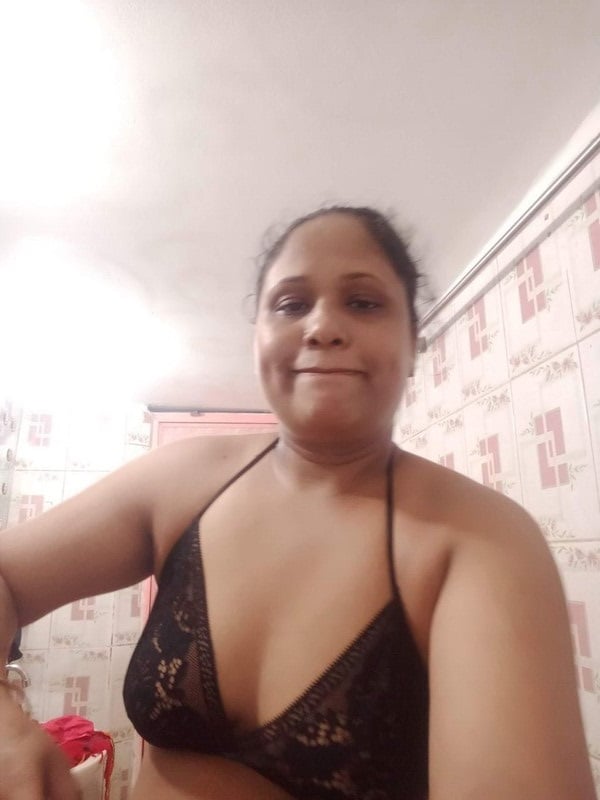 MILF standing topless in bathroom selfie show