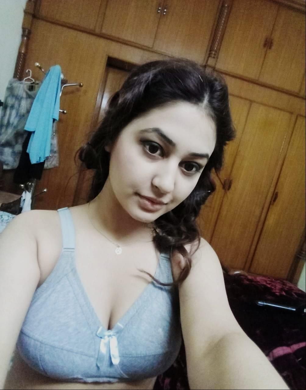 Gorgeous girl in bra shows topless body to boyfriend