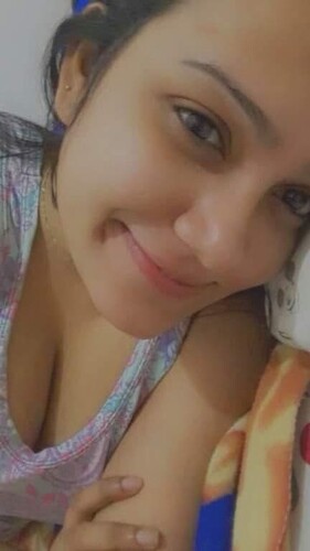 Cute Goan girl boobs showing with smiling face
