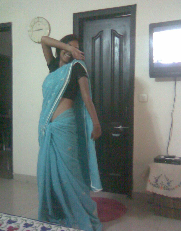 Indian babe taking shower posing