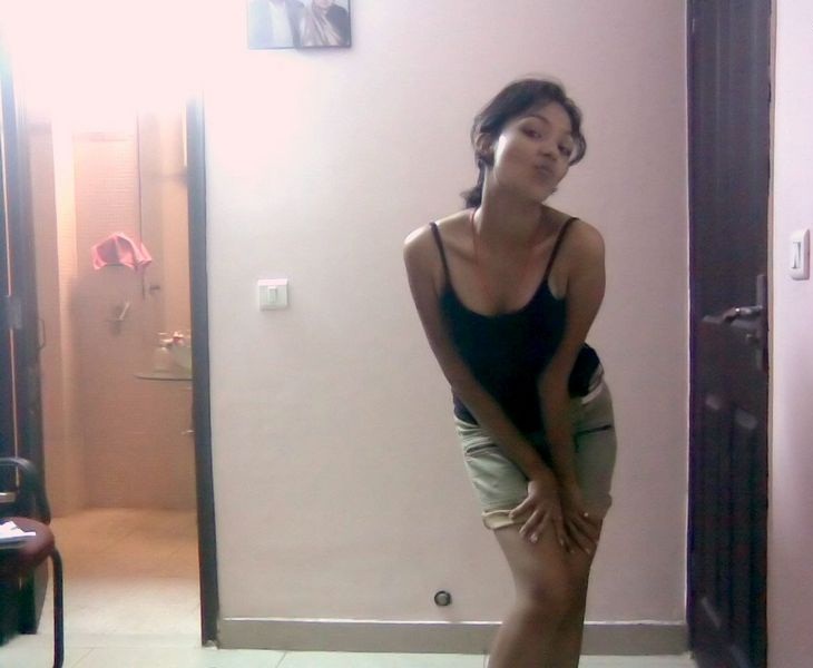 Indian babe taking shower posing