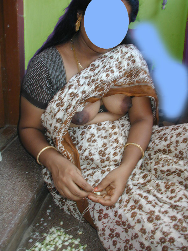 Hot Indian Village Bhabhi Showing Her Boobs