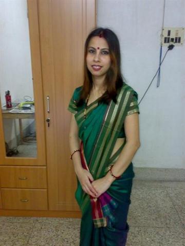 Sexy Indian Bhabhi Kusum Posing Hot On Camera