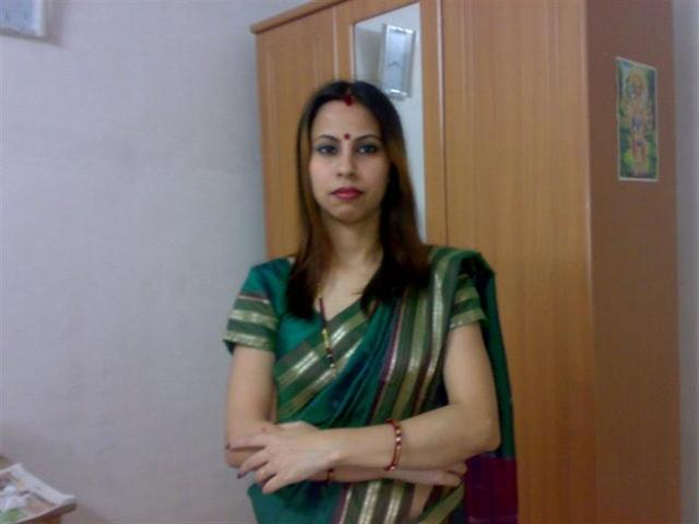 Sexy Indian Bhabhi Kusum Posing Hot On Camera