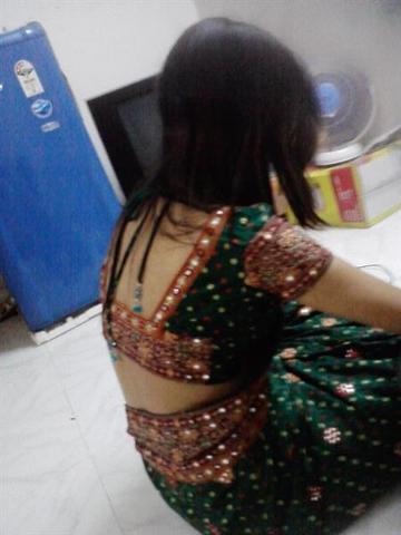 Sexy Indian Bhabhi Kusum Posing Hot On Camera