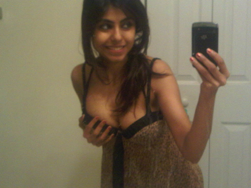 Hot juicy indian girl posing on camera