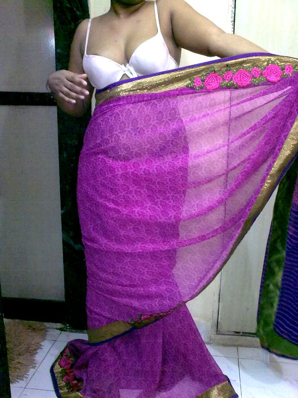 Indian homemaker stripping her traditional indian outfits