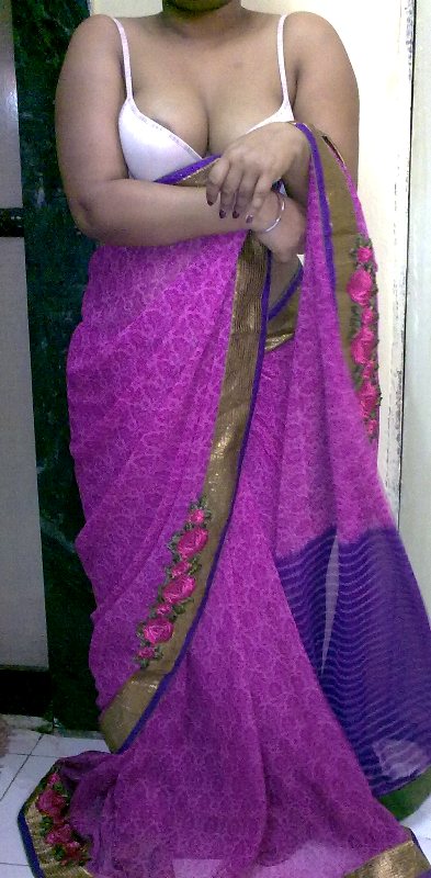 Indian homemaker stripping her traditional indian outfits