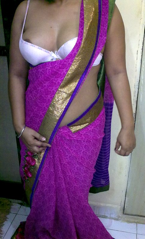 Indian homemaker stripping her traditional indian outfits