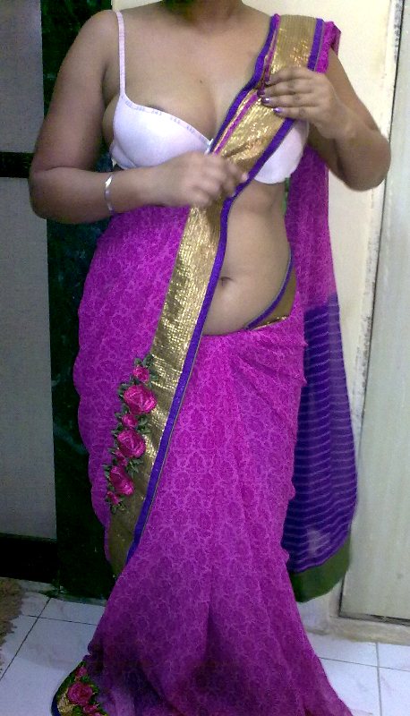 Indian homemaker stripping her traditional indian outfits