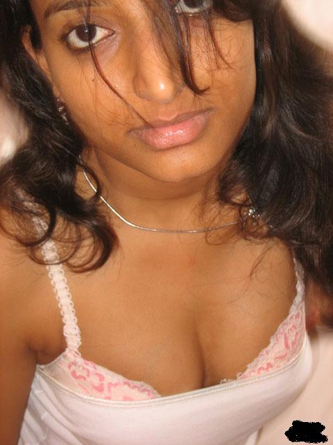 Young indian gf on beach taking her bikini off