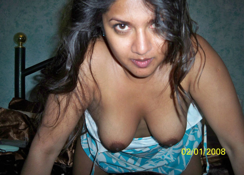 Busty indian babe laying naked in bed for her boyfriend