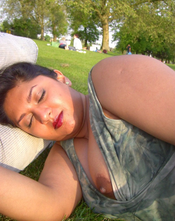 Busty indian babe laying naked in bed for her boyfriend