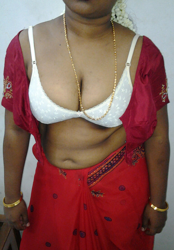 Mature indian housewife taking her indian outfits off in bedroom