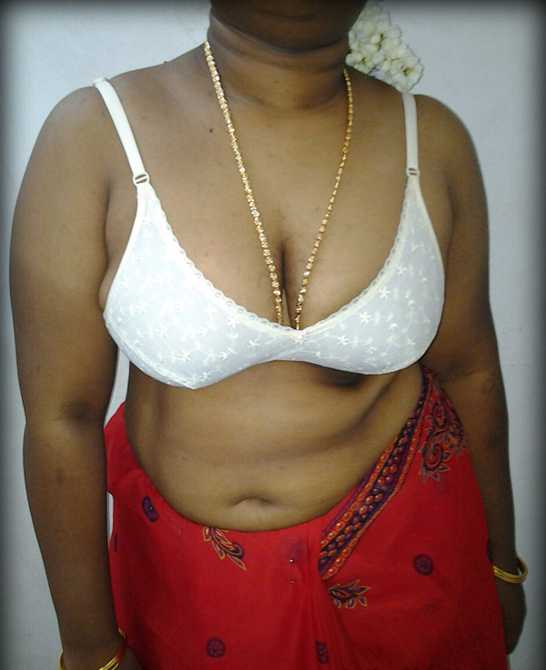 Mature indian housewife taking her indian outfits off in bedroom