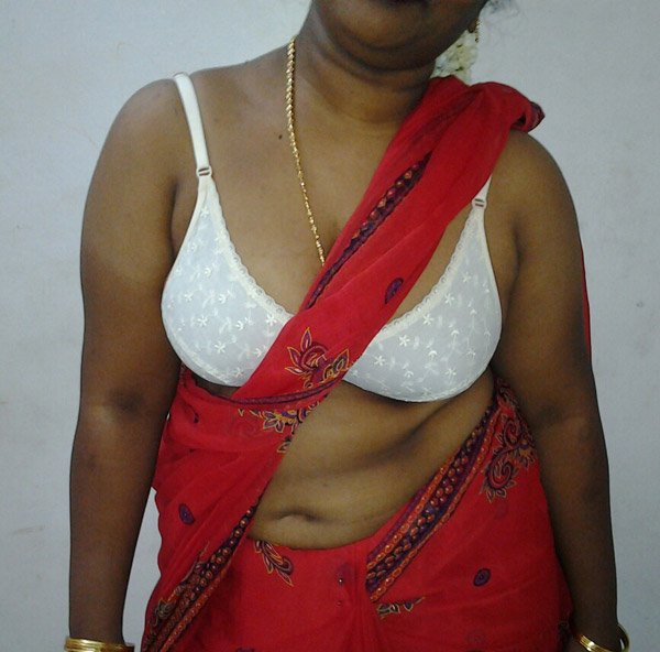 Mature indian housewife taking her indian outfits off in bedroom