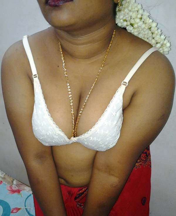 Mature indian housewife taking her indian outfits off in bedroom