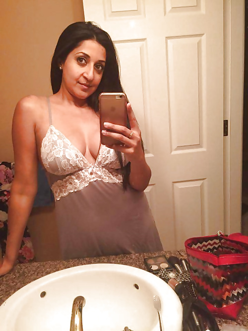 North Indian babe stripping naked flashing tits