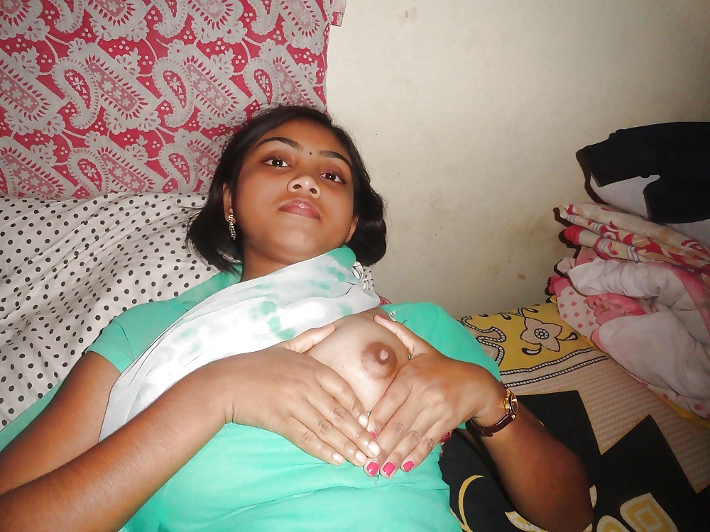 North Indian babe stripping naked flashing tits