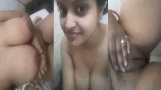 Sexy undressed Bhabhi showing her assets on cam