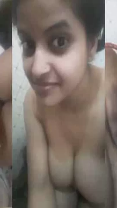 Sexy undressed Bhabhi showing her assets on cam