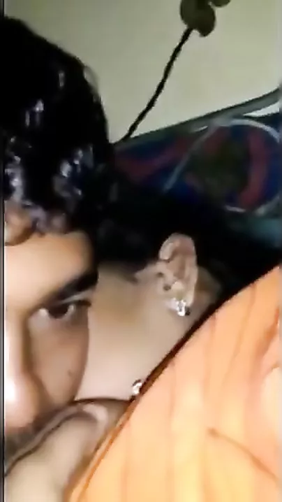 Desi aunty feeding titties to her neighbour guy