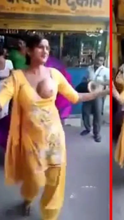 Stunning Indian aunty XXX strip dances around with one of her tits out