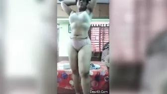 Desi camgirl with glasses undresses performing a dance in XXX show