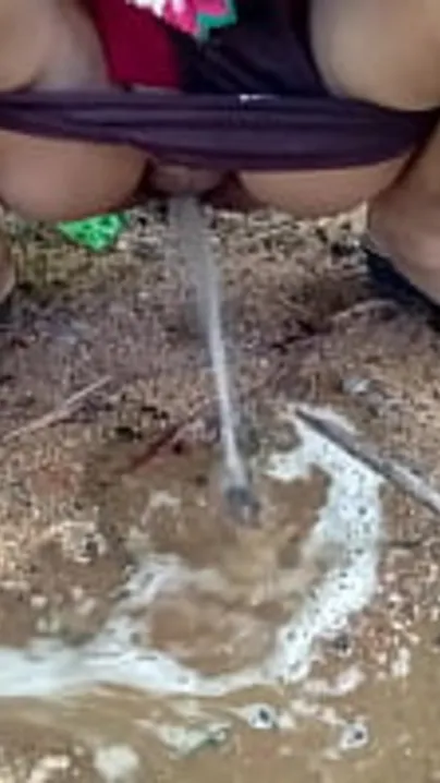 Nice compilation of Desi Bhabhi with big XXX tits pissing outdoors