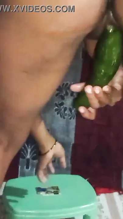 Desi woman replaces XXX toy with a cucumber and stretches pussy