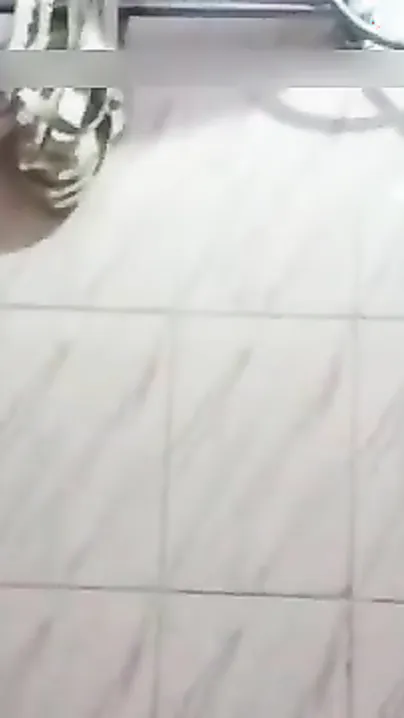 Big-boobied Desi wife takes camera to bathroom to film XXX video