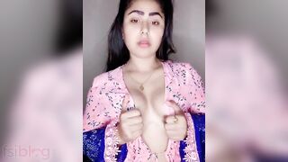 Horny Desi whore reveals and licks her young boobs on XXX camera