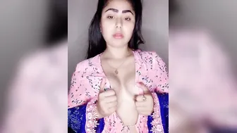 Horny Desi whore reveals and licks her young boobs on XXX camera