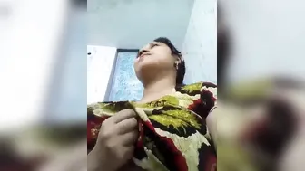 Desi fatty poses for the camera to reveal her big XXX boobs and slit