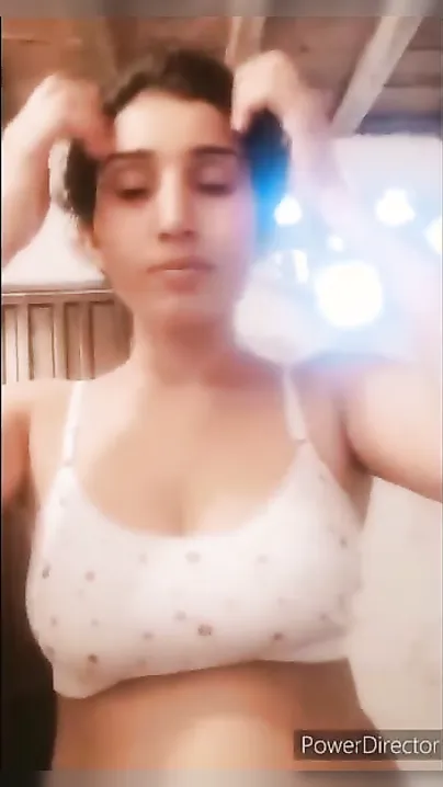 Topless Desi babe shows and squeezes her perfect tits on XXX camera