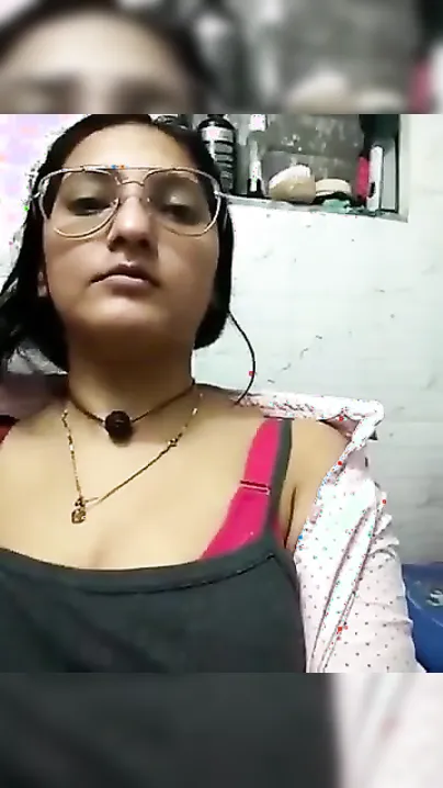 Desi slut with glasses reveals her huge XXX boobs for live show