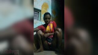 Dusky Desi whore hikes up dress to pee for XXX video in the bathroom