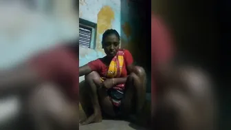 Dusky Desi whore hikes up dress to pee for XXX video in the bathroom