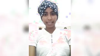 Young gal demonstrates the way she likes fingering her Desi XXX cunt