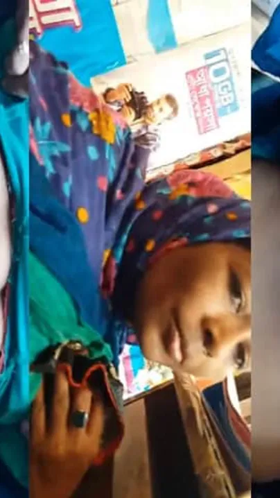 Mature Desi XXX aunty showing her big boobs to shopkeeper