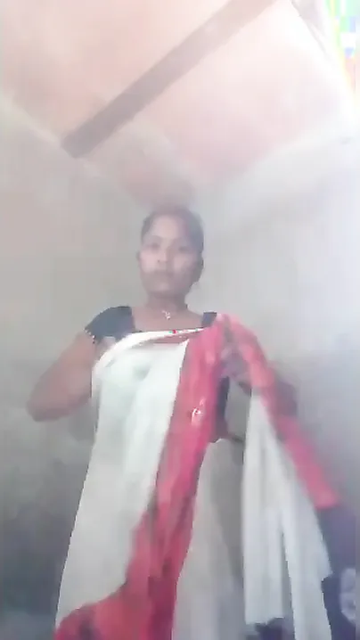 Sexy Desi wife undresses and plays with her tits and cunt XXX