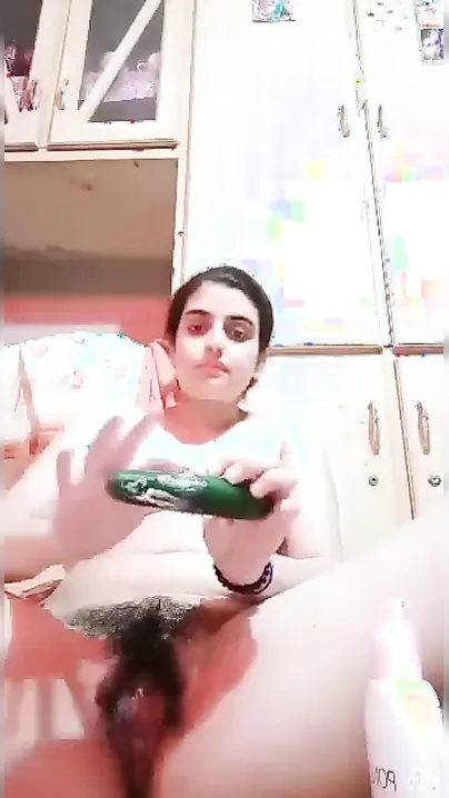 Young Desi XXX girl dildoing her bushy pussy on camera