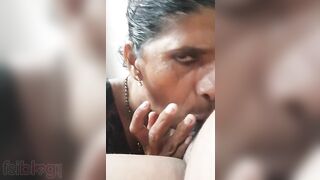 Desi cock lover over fifty sucks XXX cameraman off in this MMS video