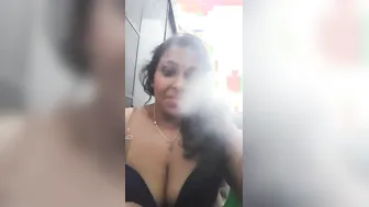 Clip of Desi whore with XXX shaped knockers exploiting bong becomes MMS
