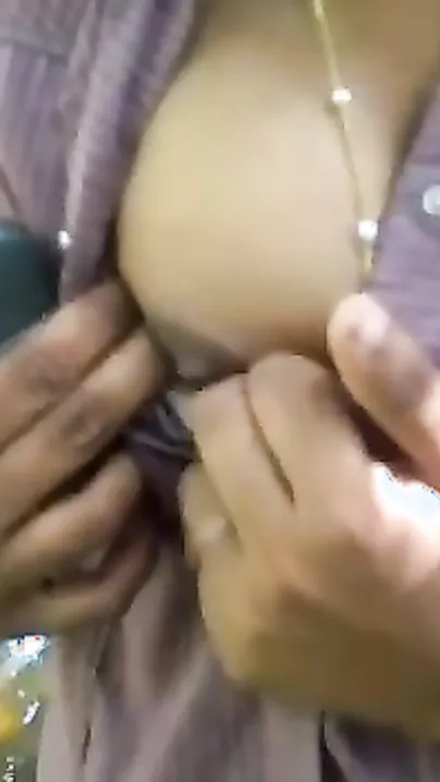 Desi charmer takes boobies out of shirt in MMS close-up XXX clip