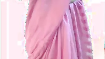 Amazing Indian XXX chick takes off her pink saree and shows boobs