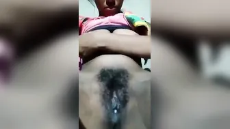 Desi village XXX girl fingering her black hairy pussy on cam