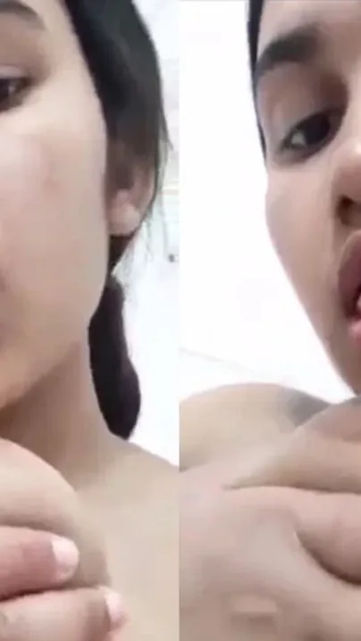 Awesome Desi chick plays with her sexy XXX breasts for the camera