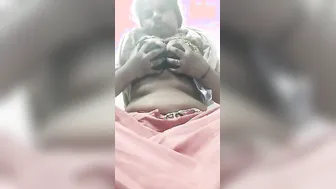 Lovely South Indian mature squeezes her XXX melons in Desi video