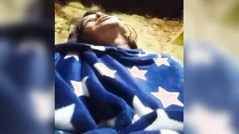 Slutty Desi girl with big XXX melons poses from under the blanket